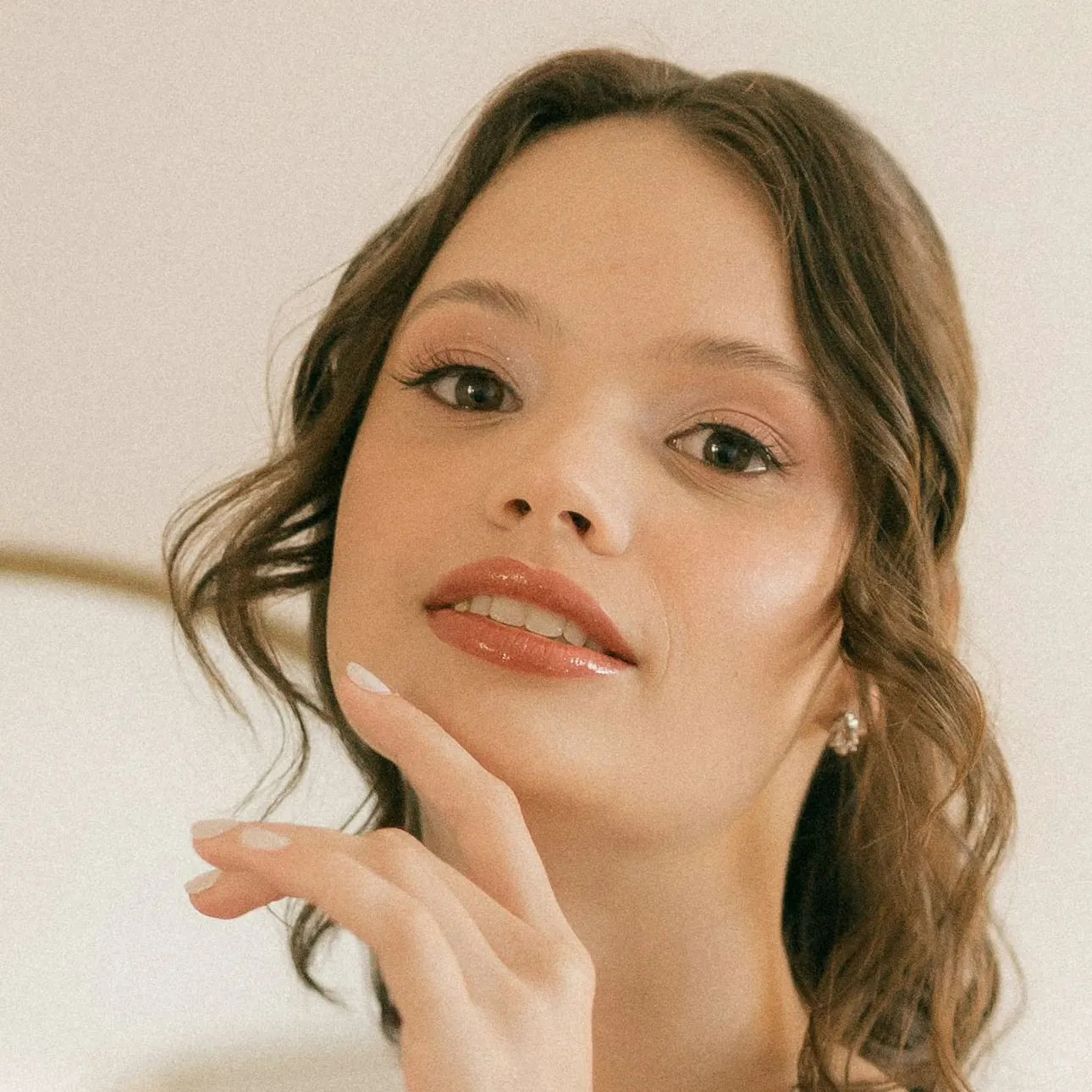 Frontal face of the subject, so the reader can judge identity