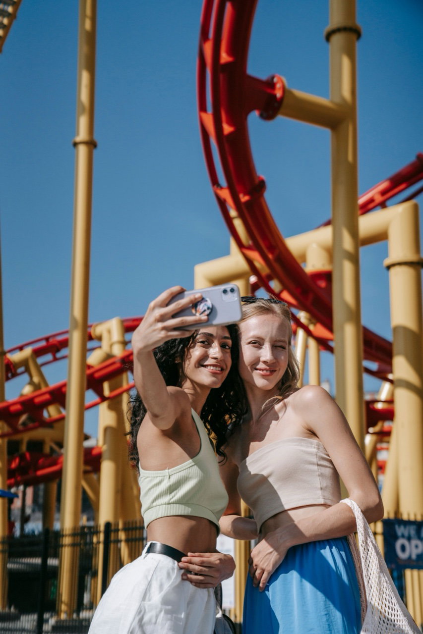 The two of them taking a phone selfie